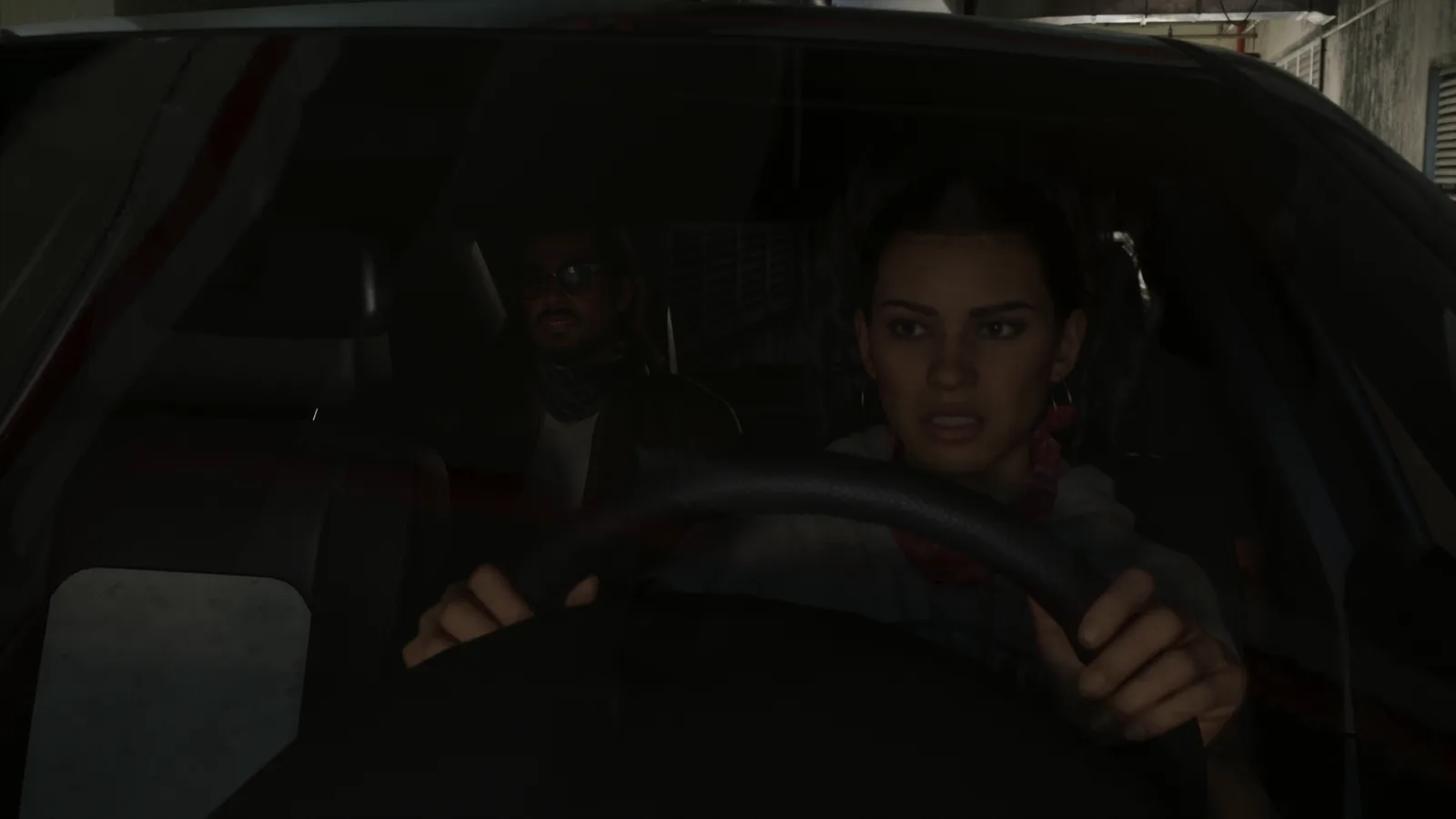 Lucia driving with Jason in the passenger seat in GTA 6
