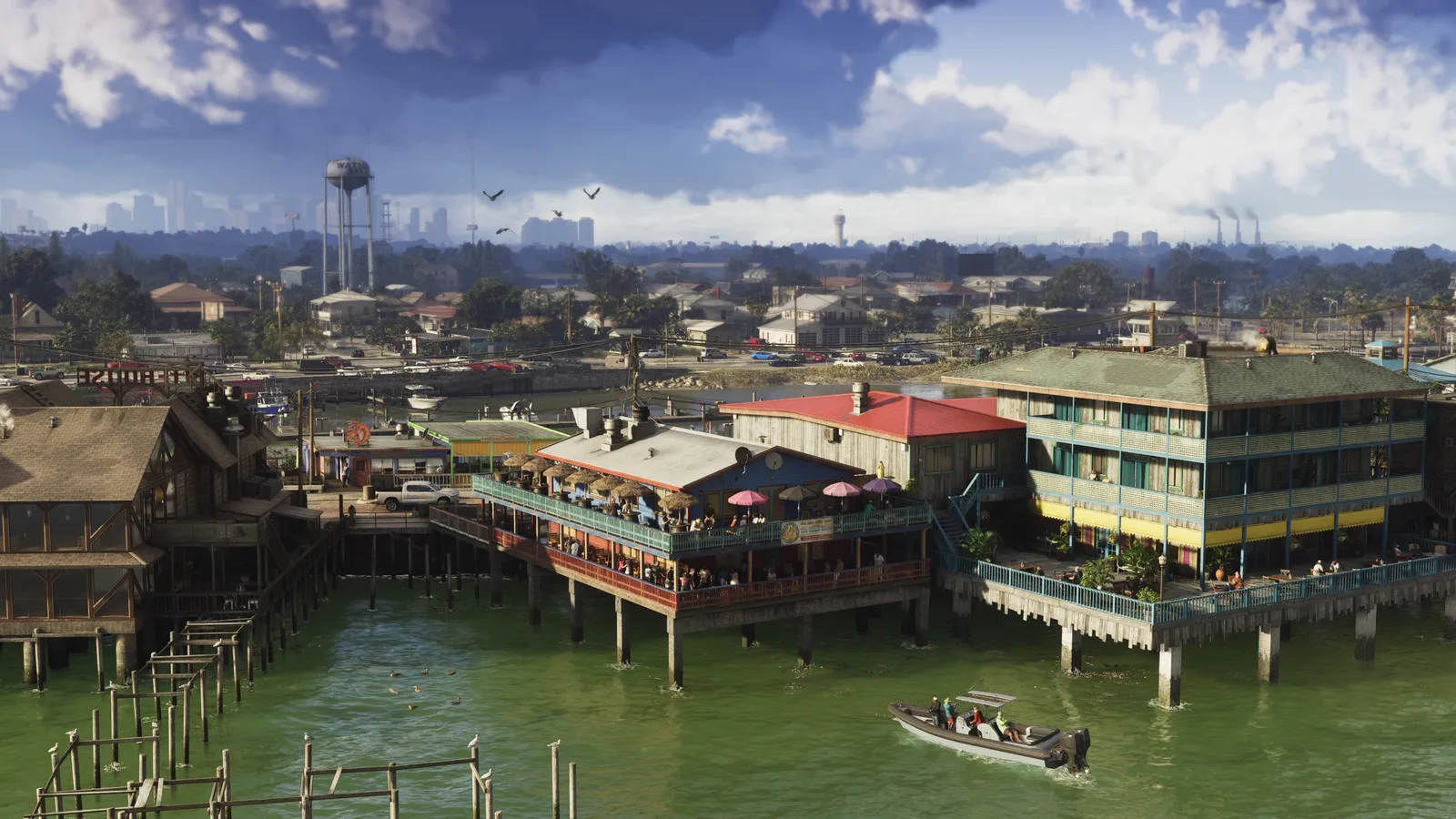Aerial view of Watson Bay's waterfront restaurants and water tower in Grand Theft Auto VI